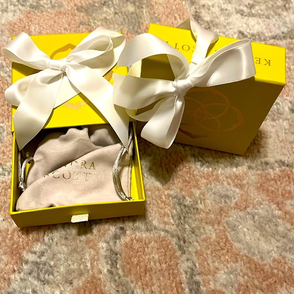 2 Kendra Scott boxes w/ pouches and bows